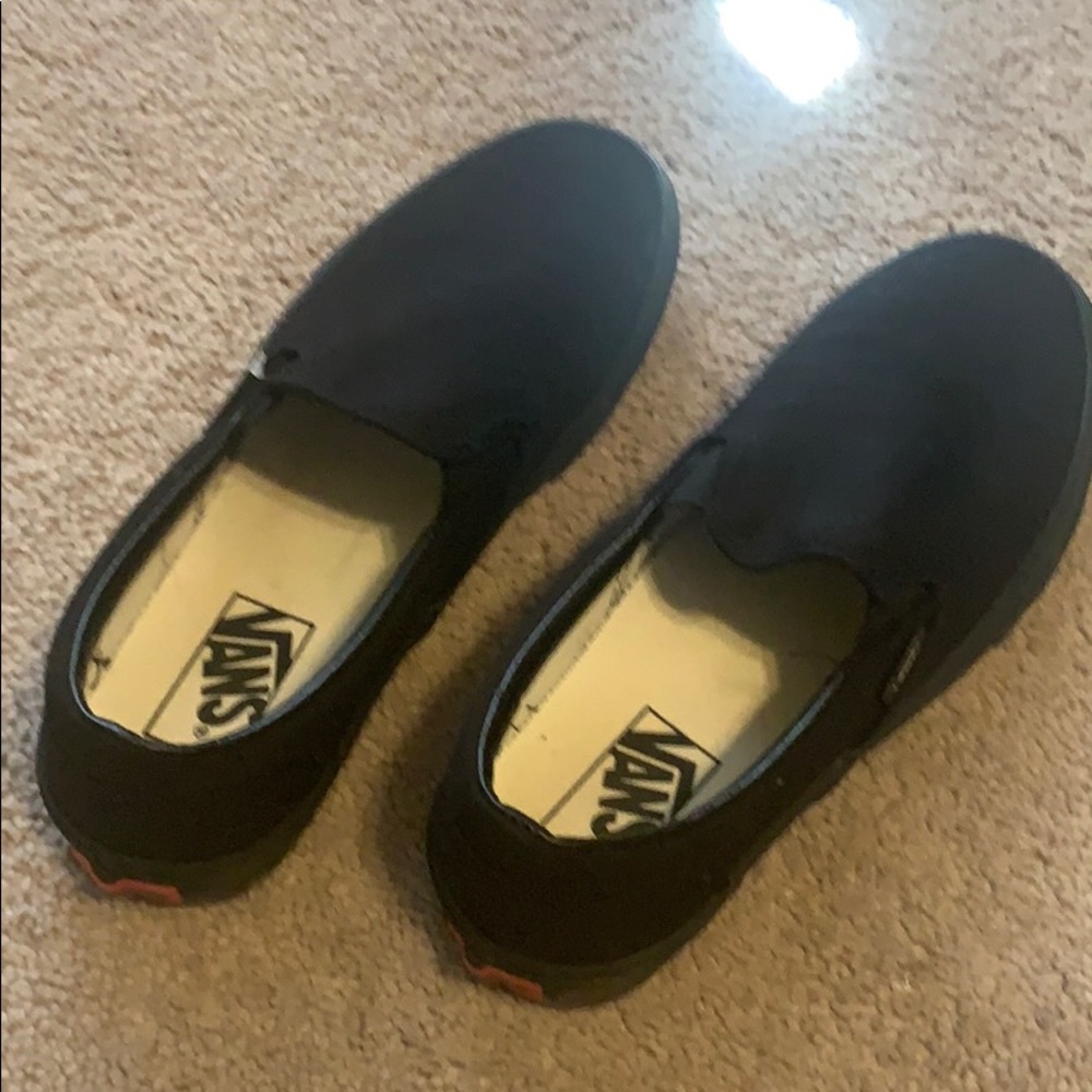 Women’s all black Vans